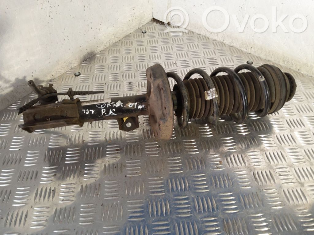 Opel Corsa D Amortyzator osi przedniej ze sprężyną 