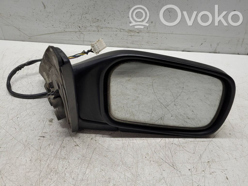 Nissan Primera Front door electric wing mirror 