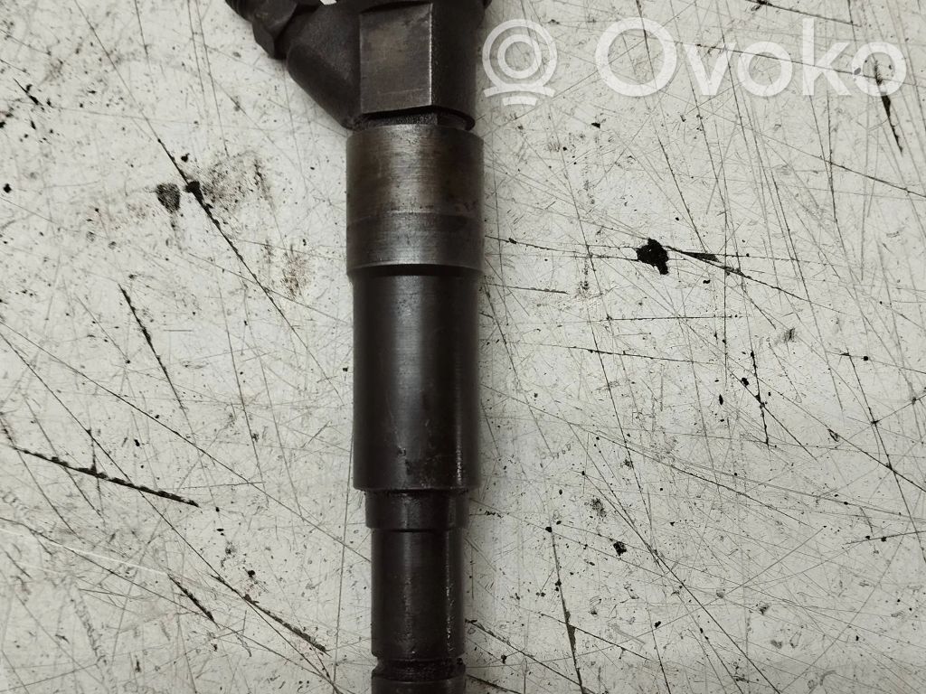 Inyector de combustible   7785984