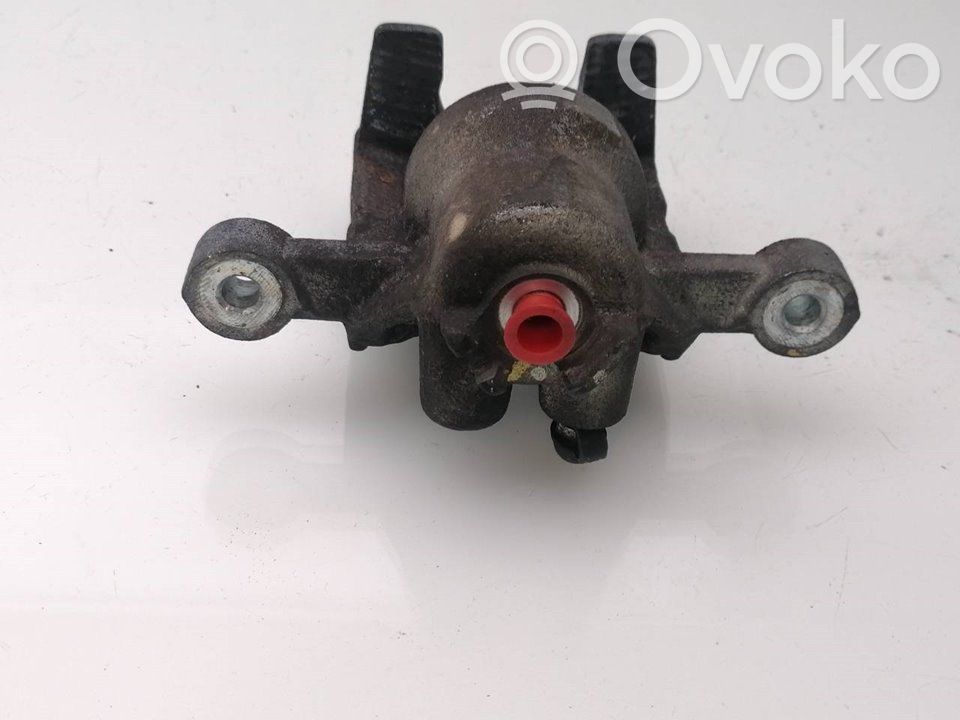 Caliper del freno trasero   582301H300