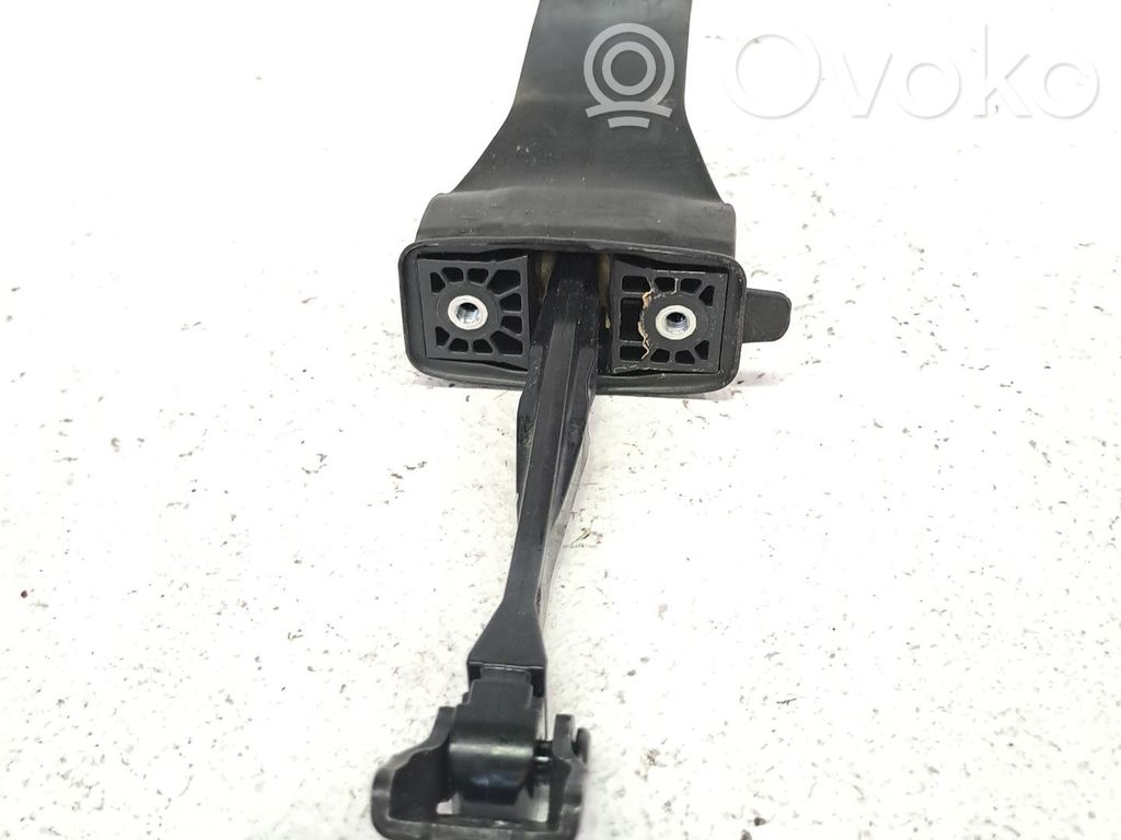 Volkswagen PASSAT B7 Etuoven pidätin 