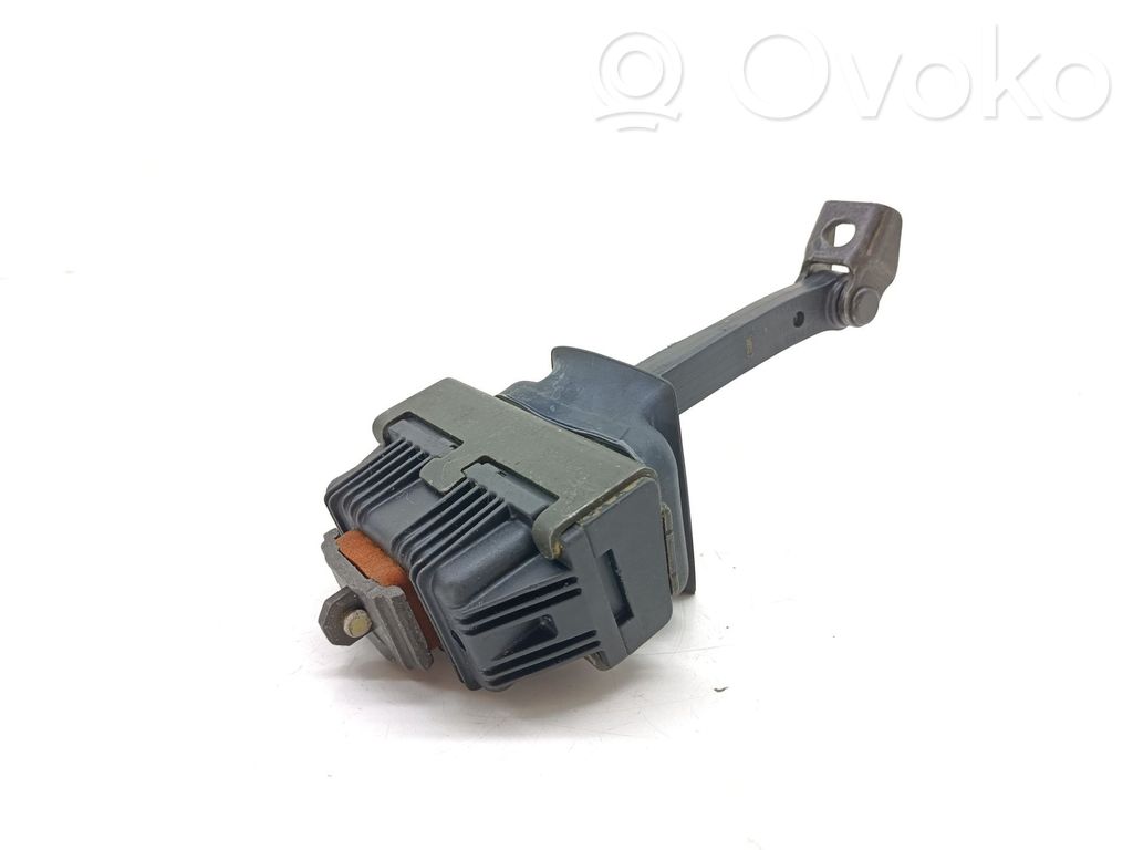 Tope freno de puerta delantera   7033609