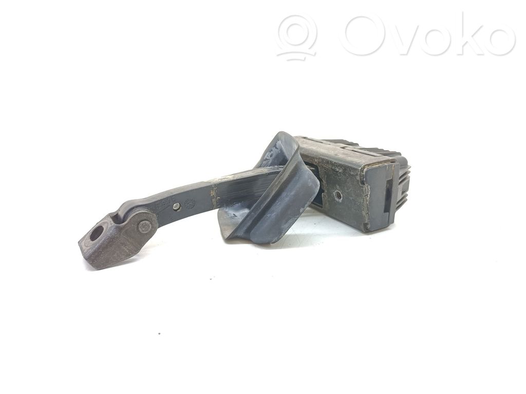 Tope freno de puerta delantera   7033609