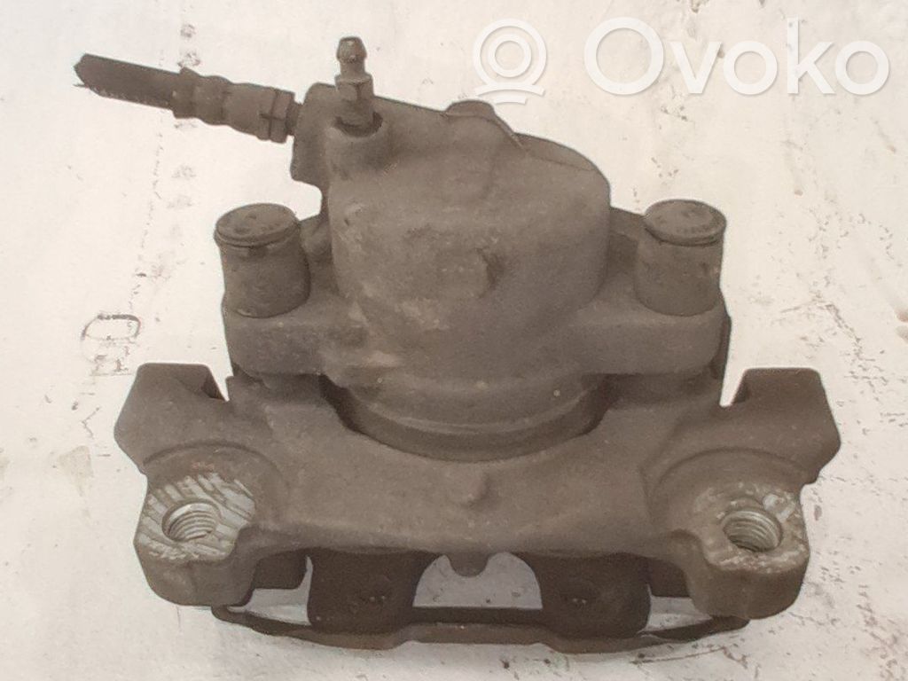 Ford Mondeo MK IV Zacisk hamulcowy przedni 