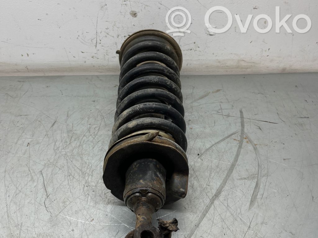 Nissan Pathfinder R51 Front shock absorber with coil spring 
