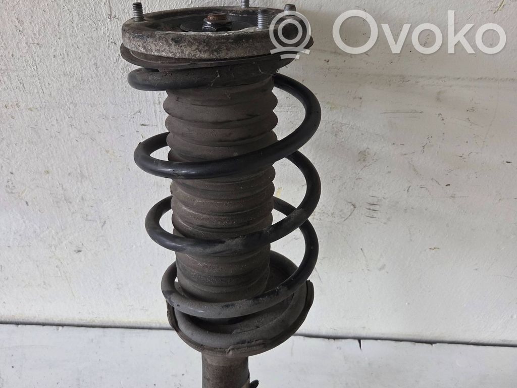 Front shock absorber with coil spring   6752597,V7310WD,10541315