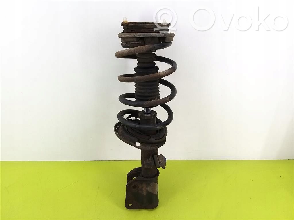 Front shock absorber with coil spring