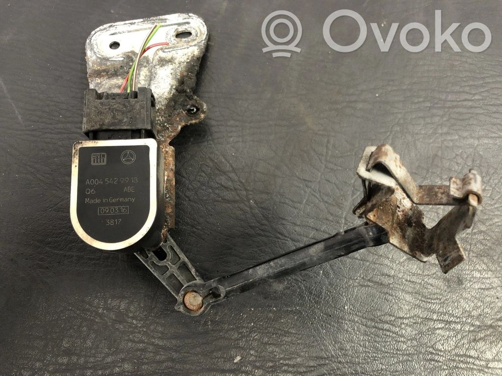 Czujnik poziomowania świateł osi przedniej   A0045429913,210651