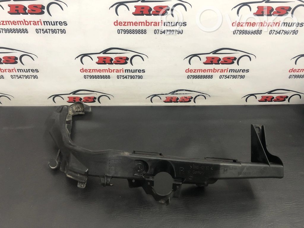 Headlight/headlamp mounting bracket   7138402,217816