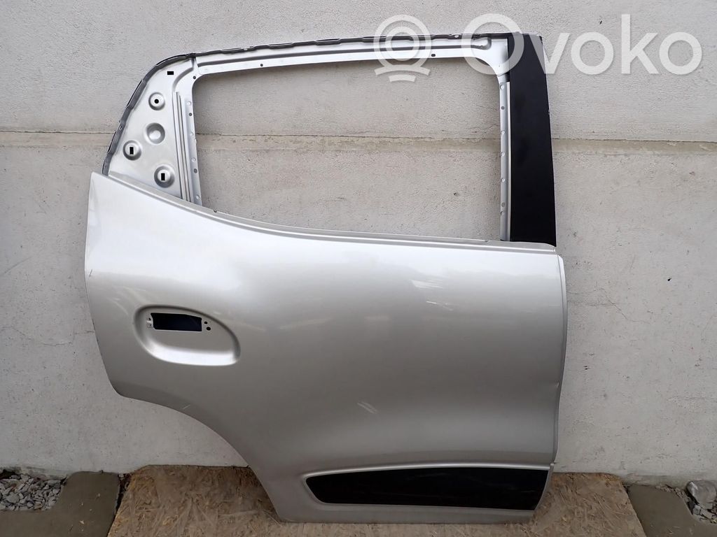 Dacia Spring Puerta trasera 