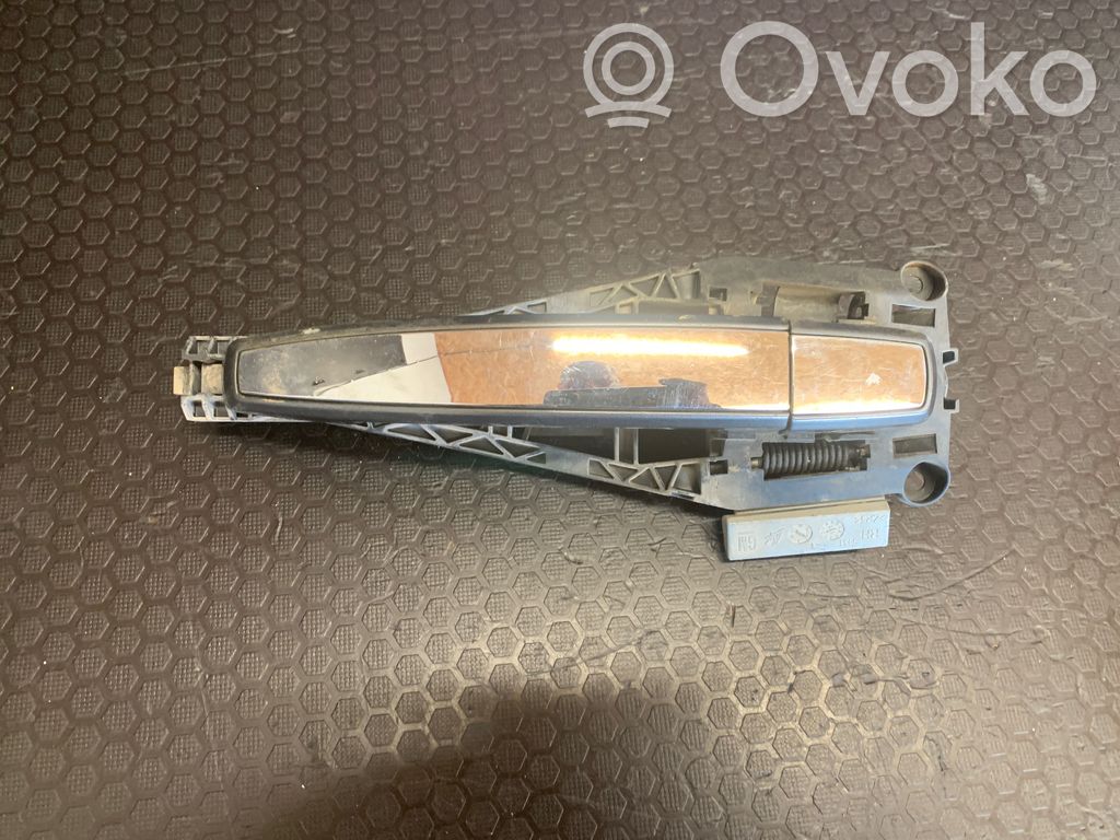 Opel Insignia A Klamka zewnętrzna drzwi przednich 
