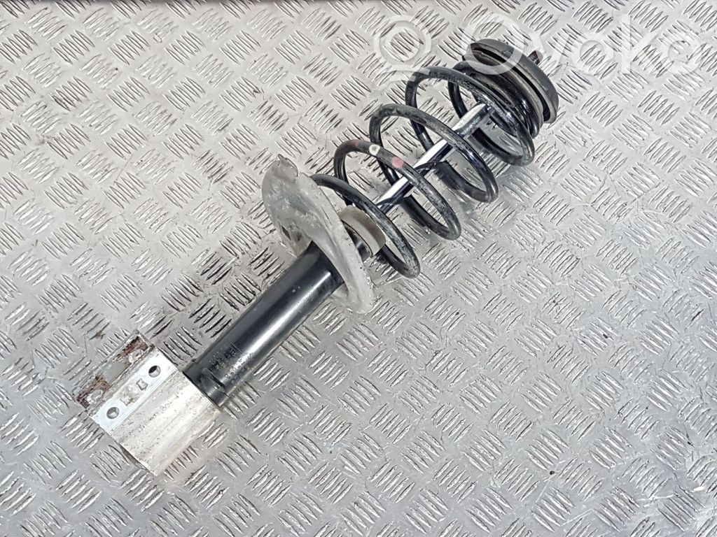 Citroen C4 II Etuiskunvaimennin kierrejousella 