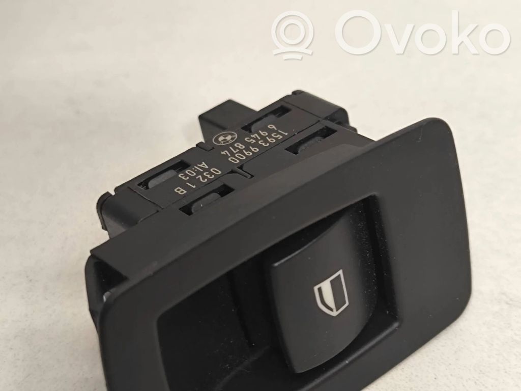 Electric window control switch   6945874,15939900,0321B