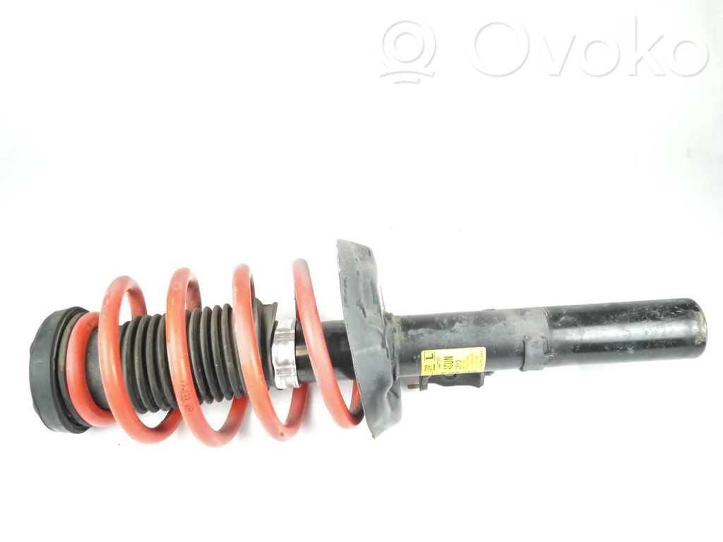 Opel Astra J Amortiguador delantero con muelle espiral