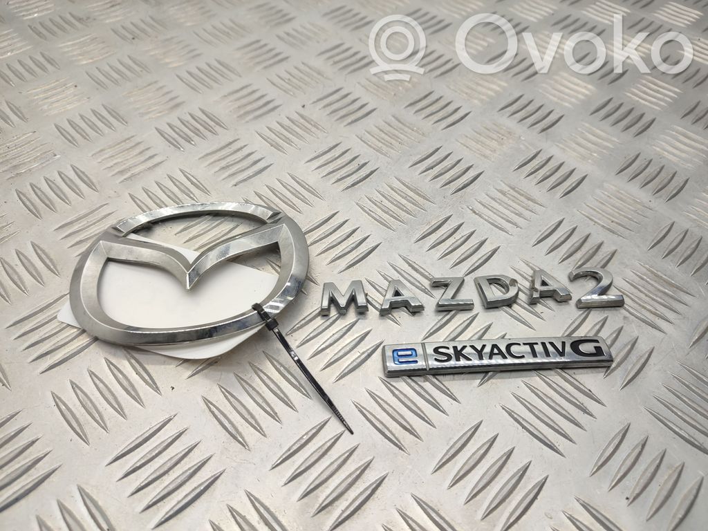 Mazda 2 Gamintojo ženkliukas/ modelio raidės 