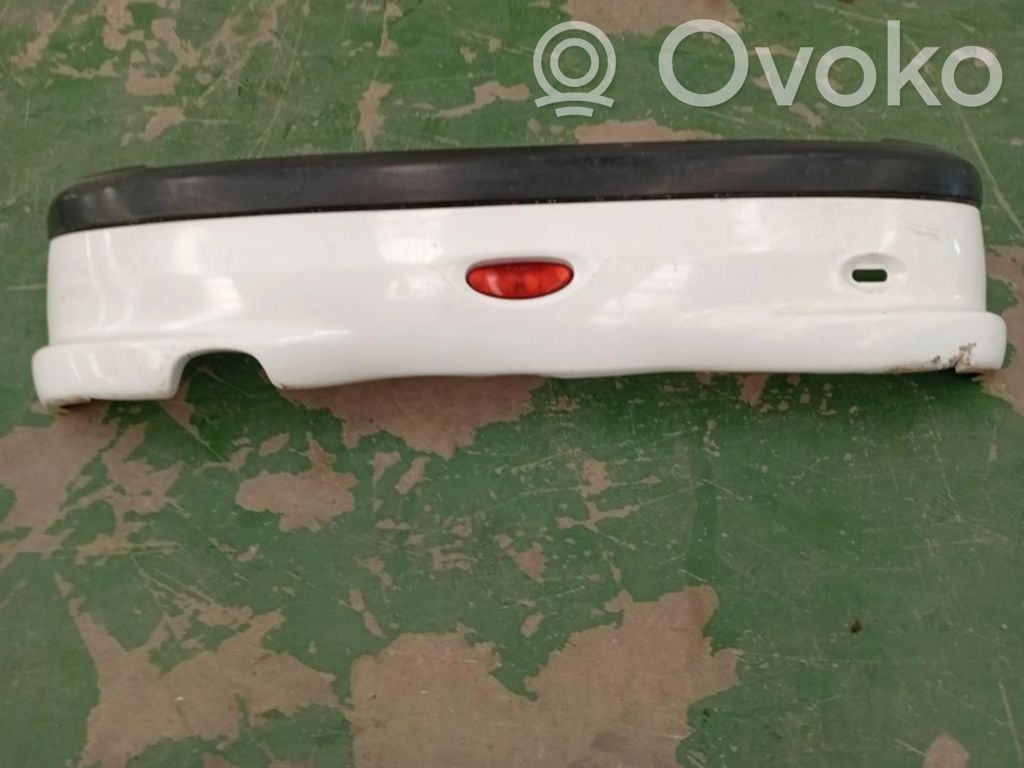 Peugeot 206+ Galinis bamperis 