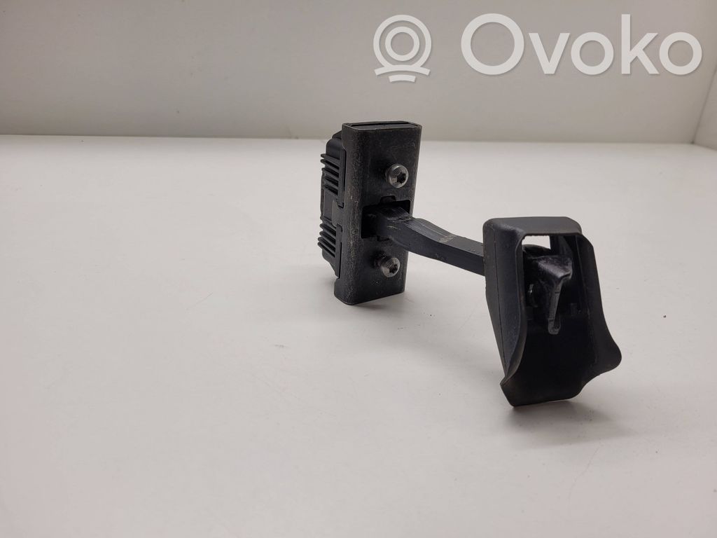 Front door check strap stopper   7164623