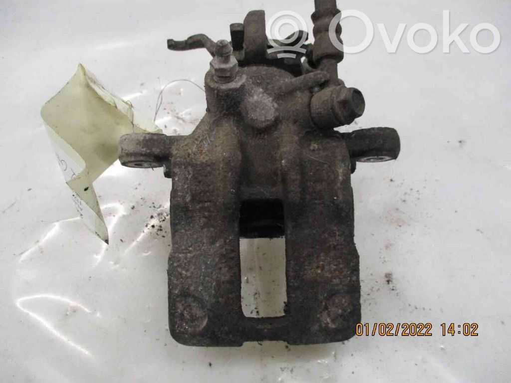 Nissan Almera Tino Tylny zacisk hamulcowy 