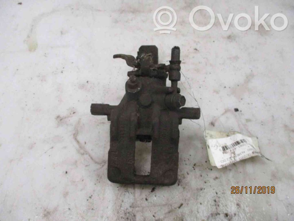 Nissan Almera Tino Tylny zacisk hamulcowy 