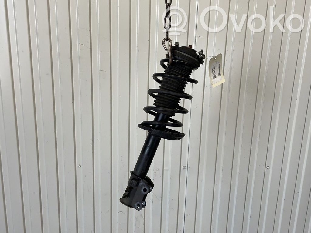 Opel Combo D Front shock absorber with coil spring 