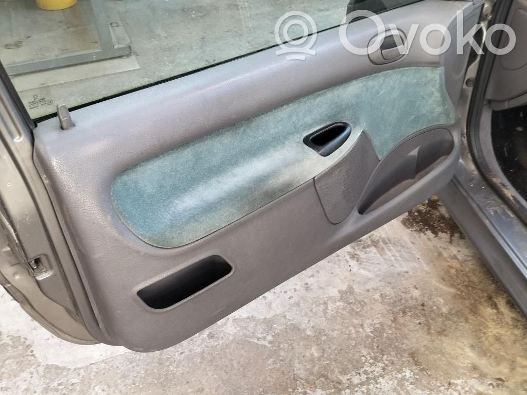 Peugeot 206 Zamek drzwi przednich 