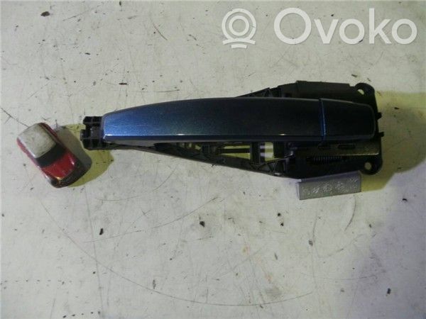 Opel Astra J Front door exterior handle 
