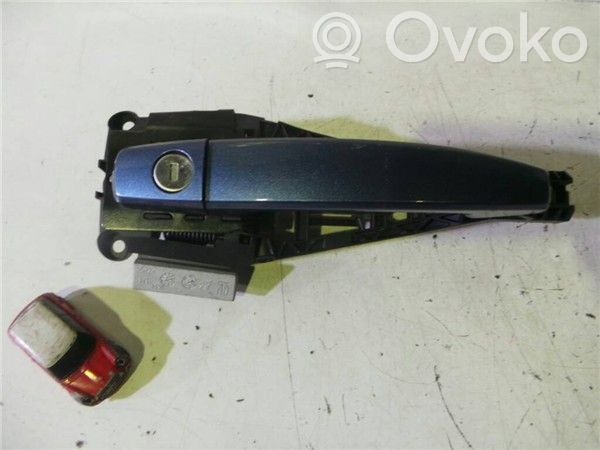 Opel Astra J Front door exterior handle 