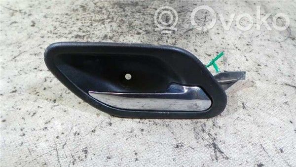 Manecilla interna puerta delantera