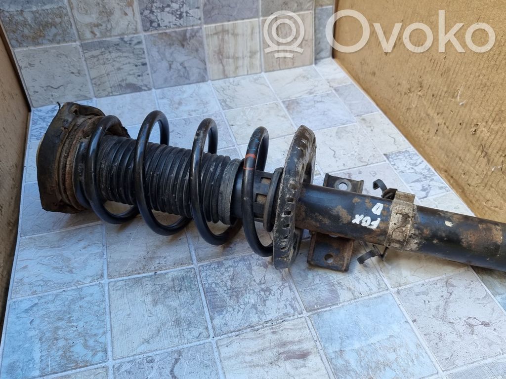 Volkswagen Fox Amortyzator osi przedniej ze sprężyną 