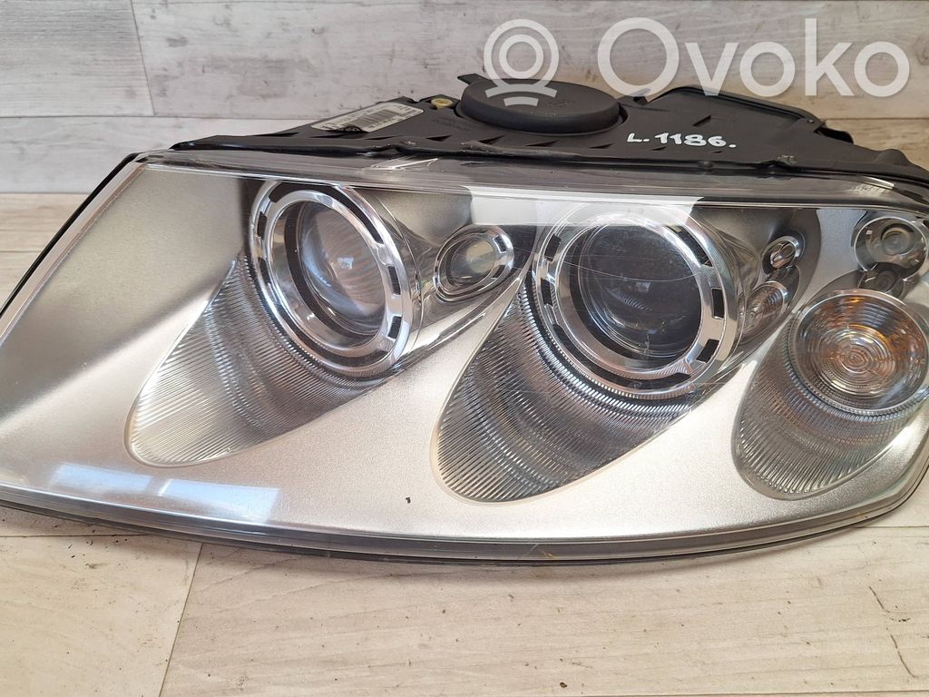 Volkswagen Touareg I Lampa przednia 