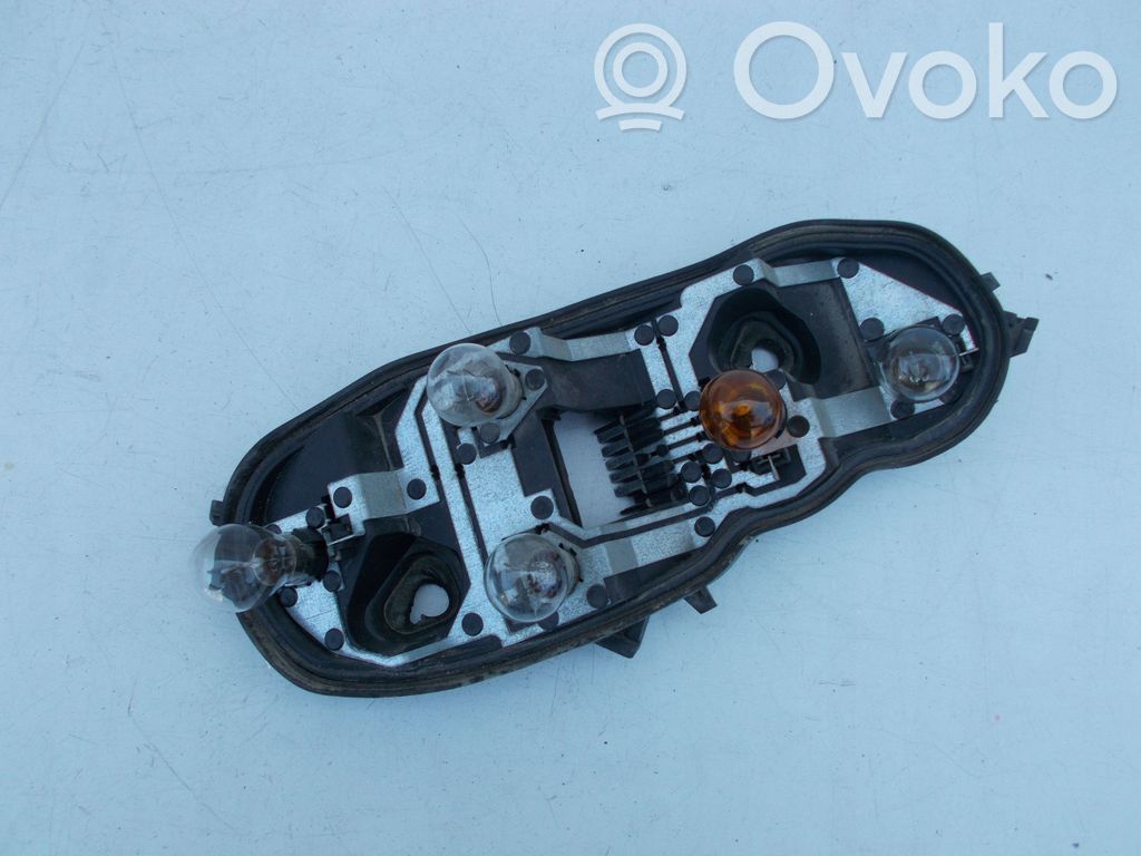 Opel Corsa D Takavalon polttimon suojan pidike 