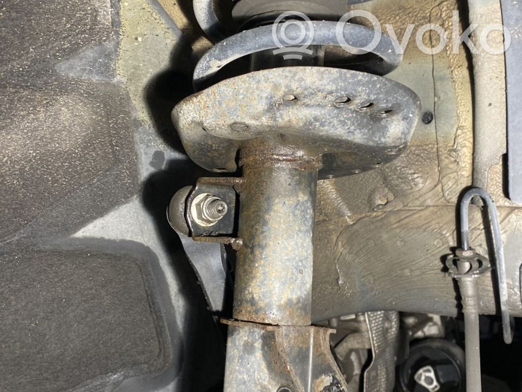 Opel Zafira C Amortyzator osi przedniej ze sprężyną 