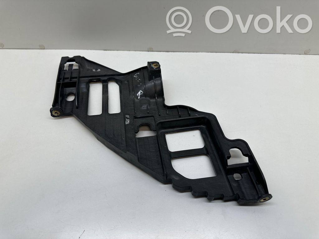 Volkswagen Golf VI Uchwyt / Mocowanie lampy przedniej 