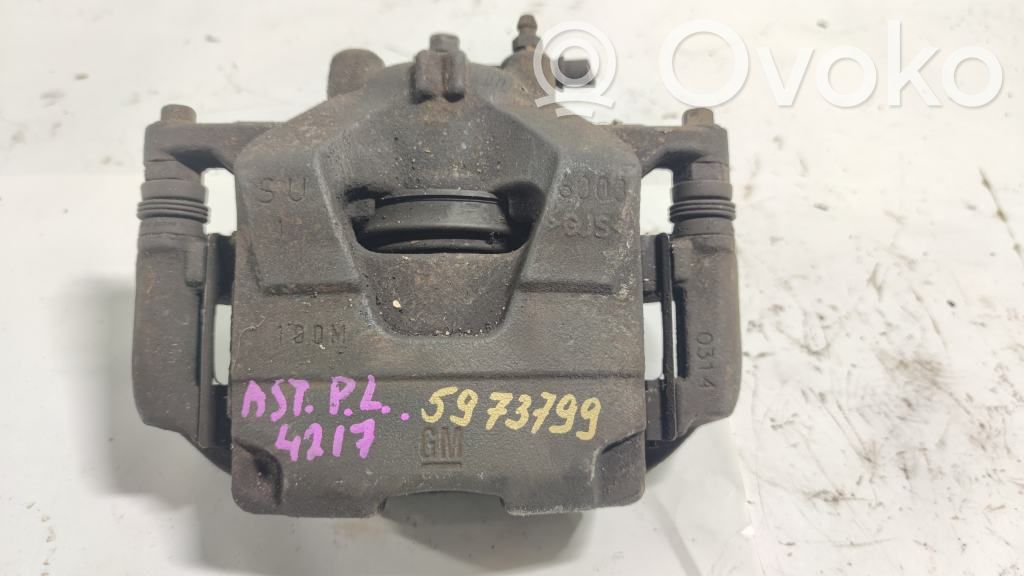 Opel Astra J Front brake caliper 