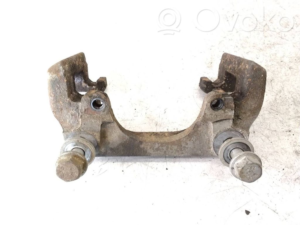 Plaquette / support d'étrier avant
