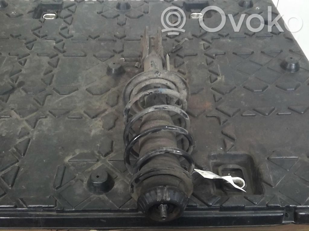 Toyota Yaris Amortyzator osi przedniej ze sprężyną 