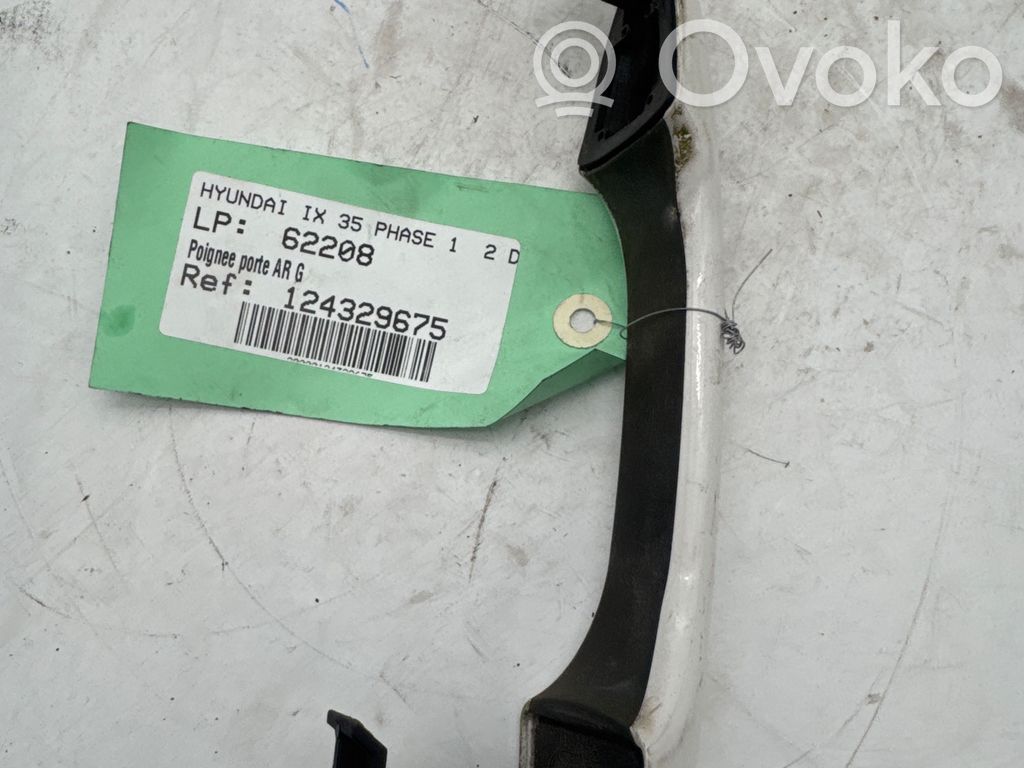 Manecilla externa puerta trasera   826512Y010