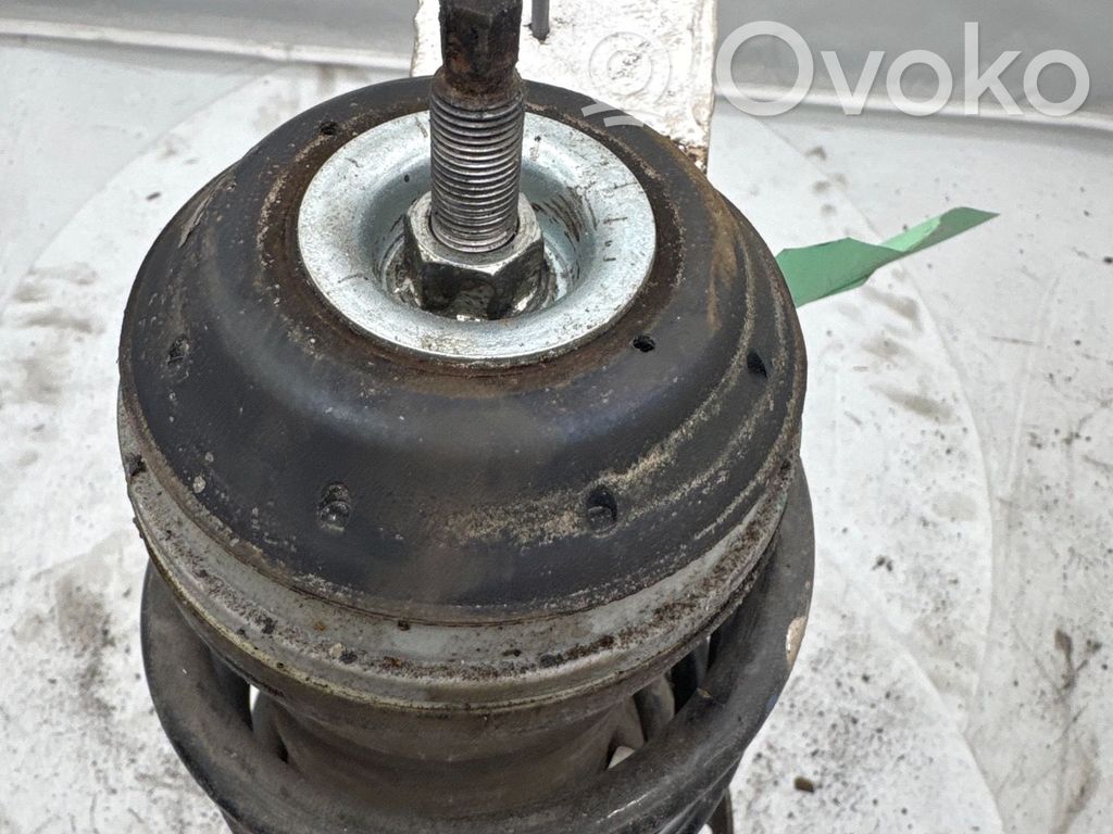 Opel Corsa D Amortyzator osi przedniej ze sprężyną 