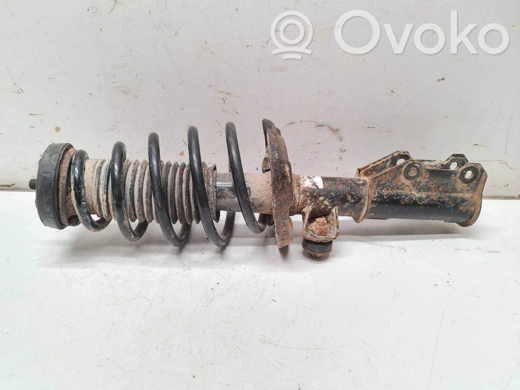 Opel Astra J Amortyzator osi przedniej ze sprężyną 