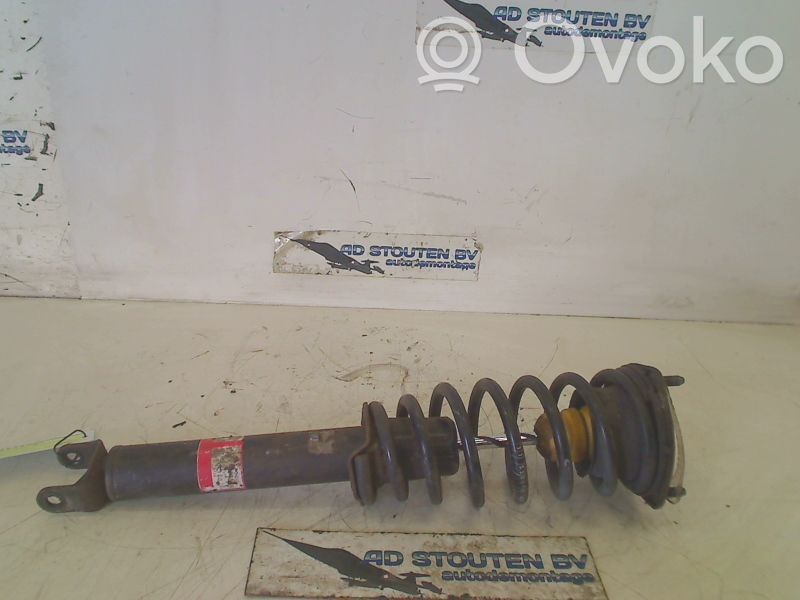 Front shock absorber with coil spring