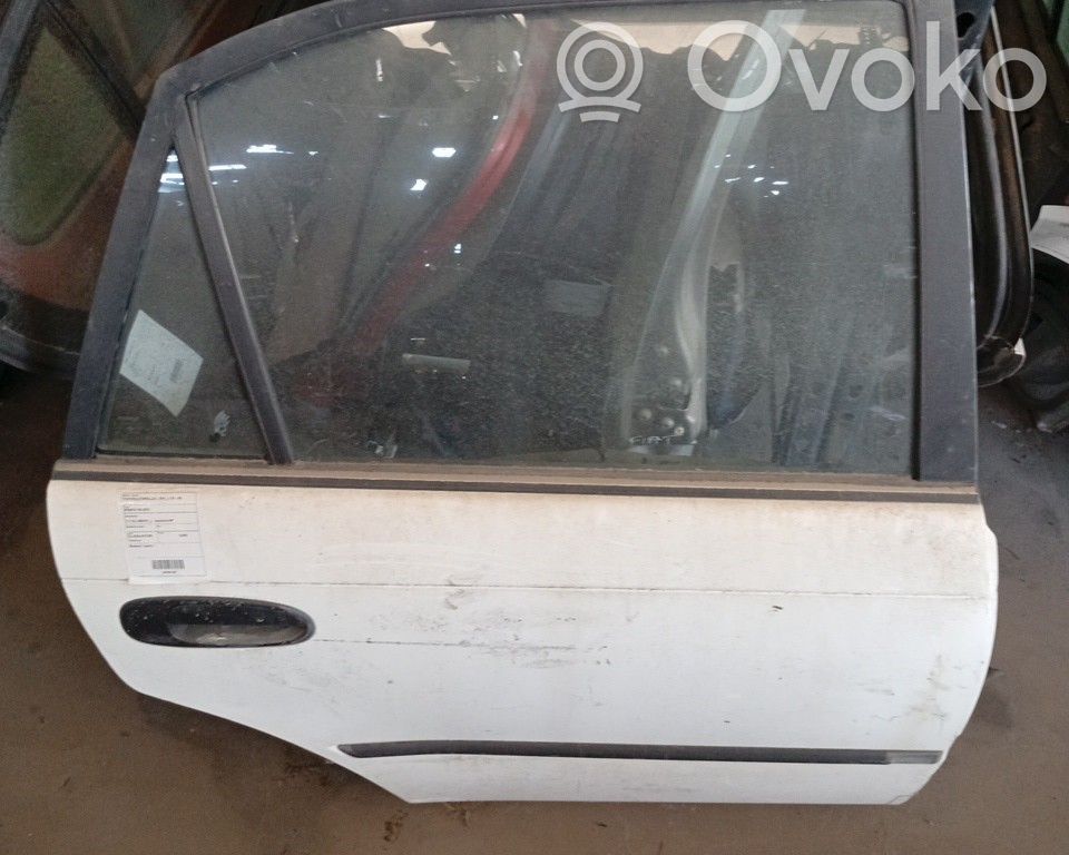 Toyota Corolla E110 Задняя дверь 