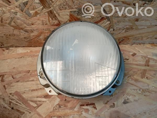 Volkswagen Polo II 86C 2F Lampa przednia 