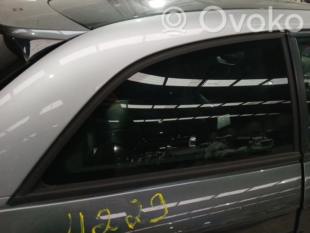 Vidrio lateral trasero