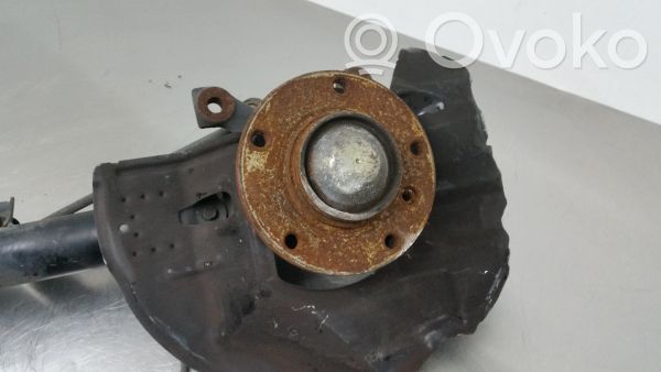 Front wheel hub spindle knuckle