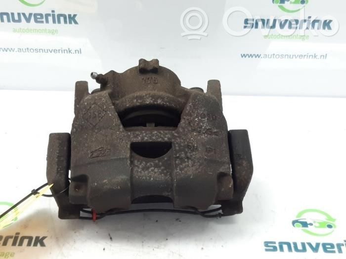Renault Laguna III Zacisk hamulcowy przedni 