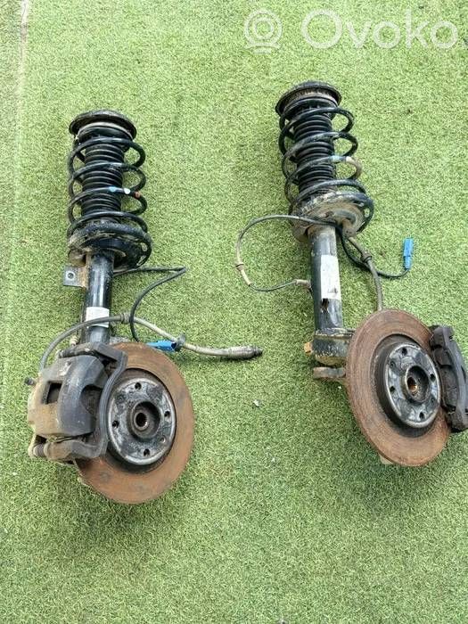 Front wheel hub spindle knuckle