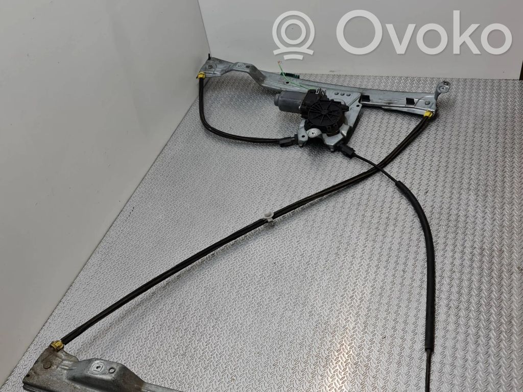 Renault Clio III Elektryczny podnośnik szyby drzwi przednich 