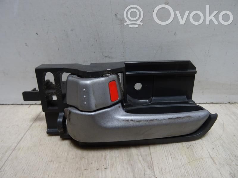 Suzuki Swift I Mâner interior ușă față 
