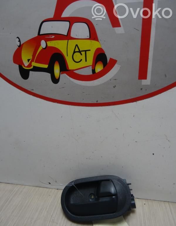 Mitsubishi Colt Manecilla interna puerta delantera 