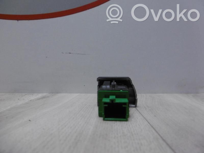 Botón interruptor de bloqueo de puertas